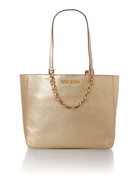 michael kors gold chain clutch|michael kors gold tote handbags.